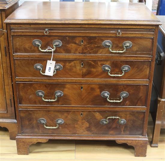 A George III style banded mahogany bachelor chest fitted brushing slide, W.68cm